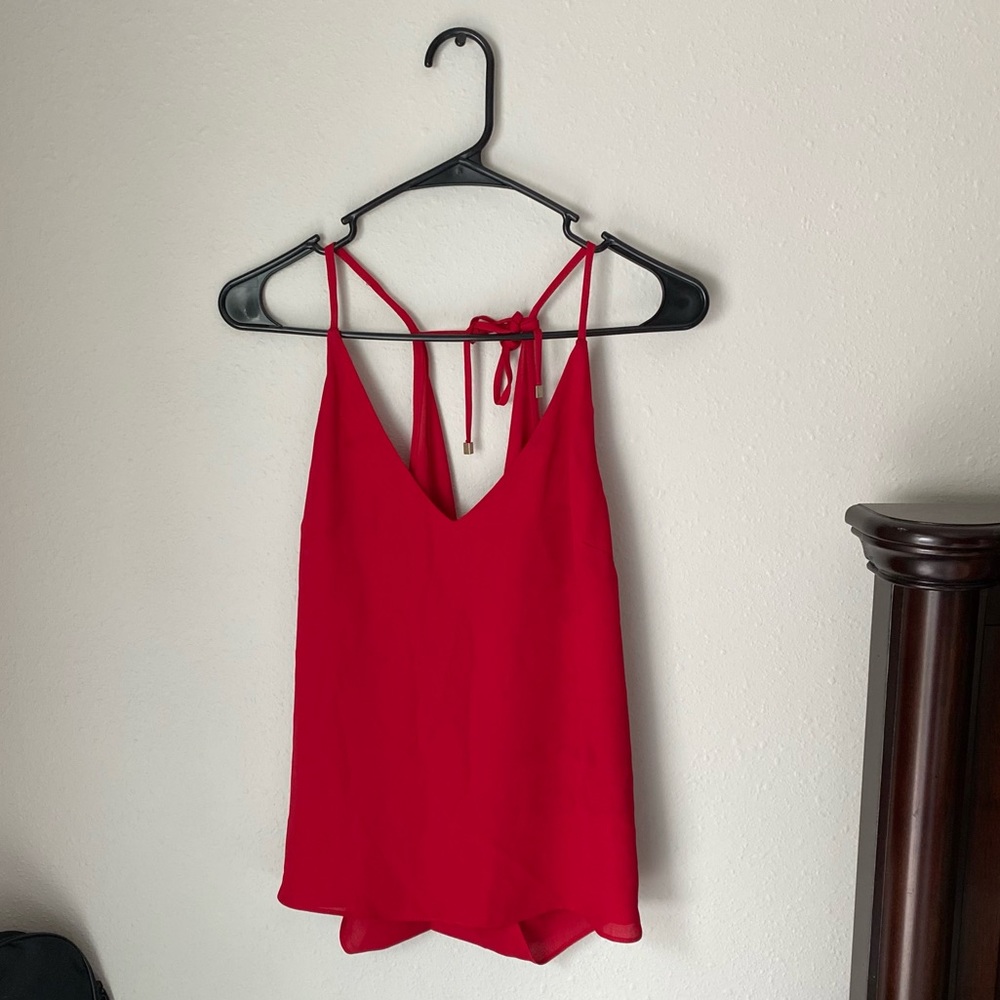 Red flowing top with criss crossed straps